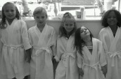 group of girls in bath robes