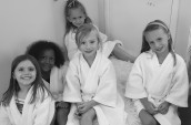 group of girls on a fluffy rug