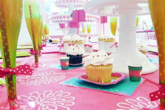 placemats with a cupcake and drink laid out on each
