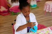 girl playing with gooey substance