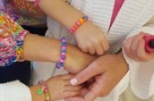 girls showing of their bracelets