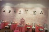 spartea letters on the wall above spa tables